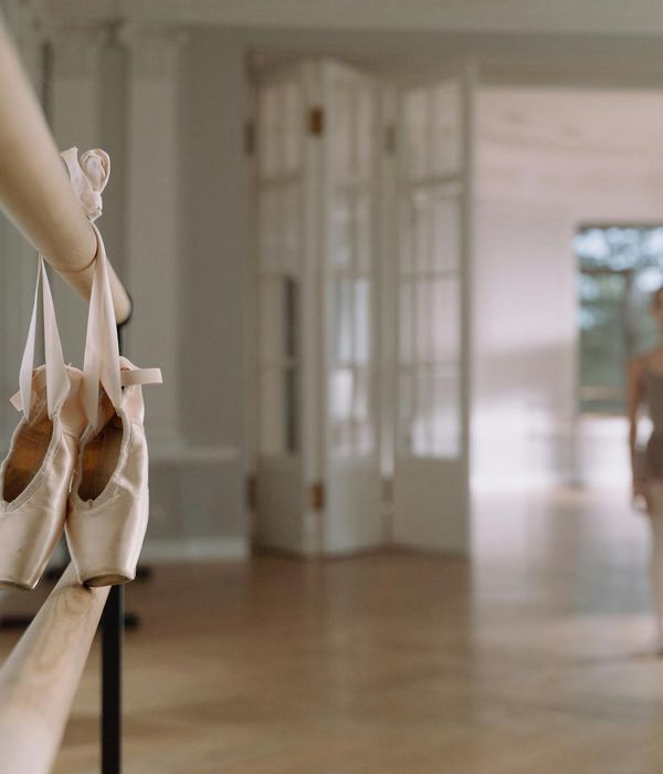 Person practicing gentle movements in a bright room